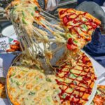 بيتزا نص ونص كبيره