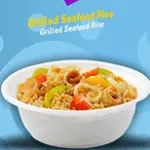 أرز بالمأكولات البحرية المشوية