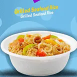 أرز بالمأكولات البحرية المشوية